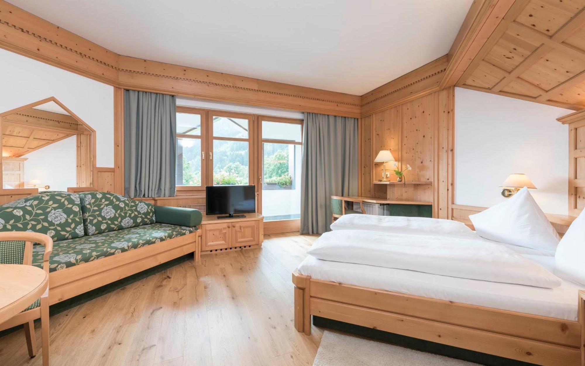 Ferien & Wellnesshotel Windschar Брунико Номер фото
